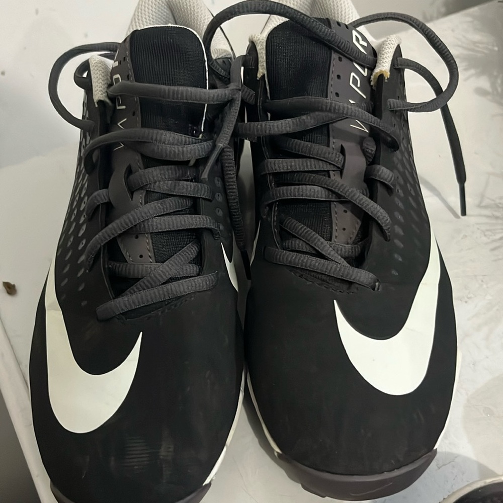Football cleats shoe.